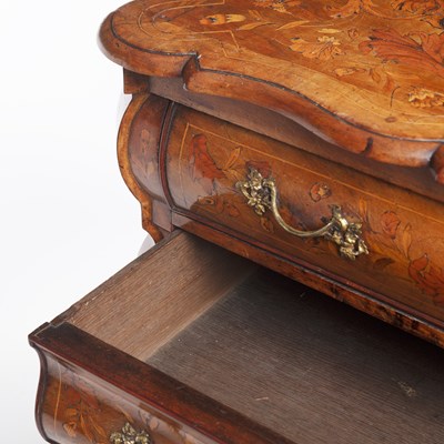 Lot 21 - A late 18th century Dutch marquetry bombé chest of drawers