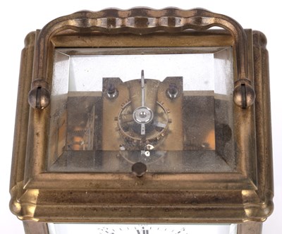 Lot 23 - A late 19th century French carriage clock, the...