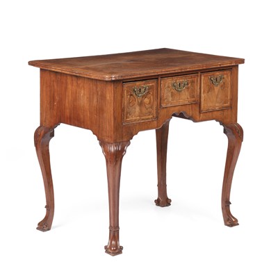 Lot 25 - A Georgian walnut lowboy