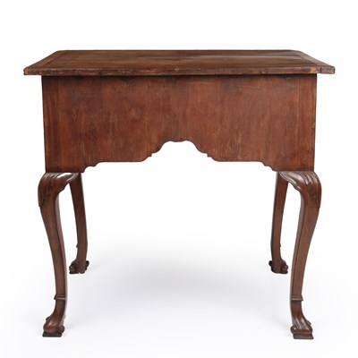 Lot 25 - A Georgian walnut lowboy