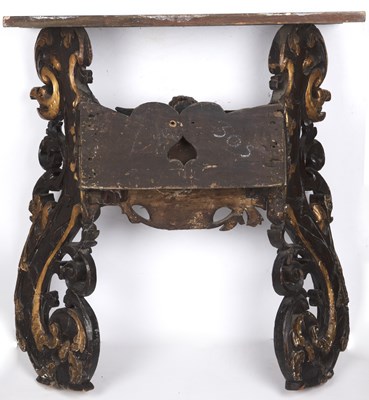 Lot 33 - An antique Italian carved giltwood console...