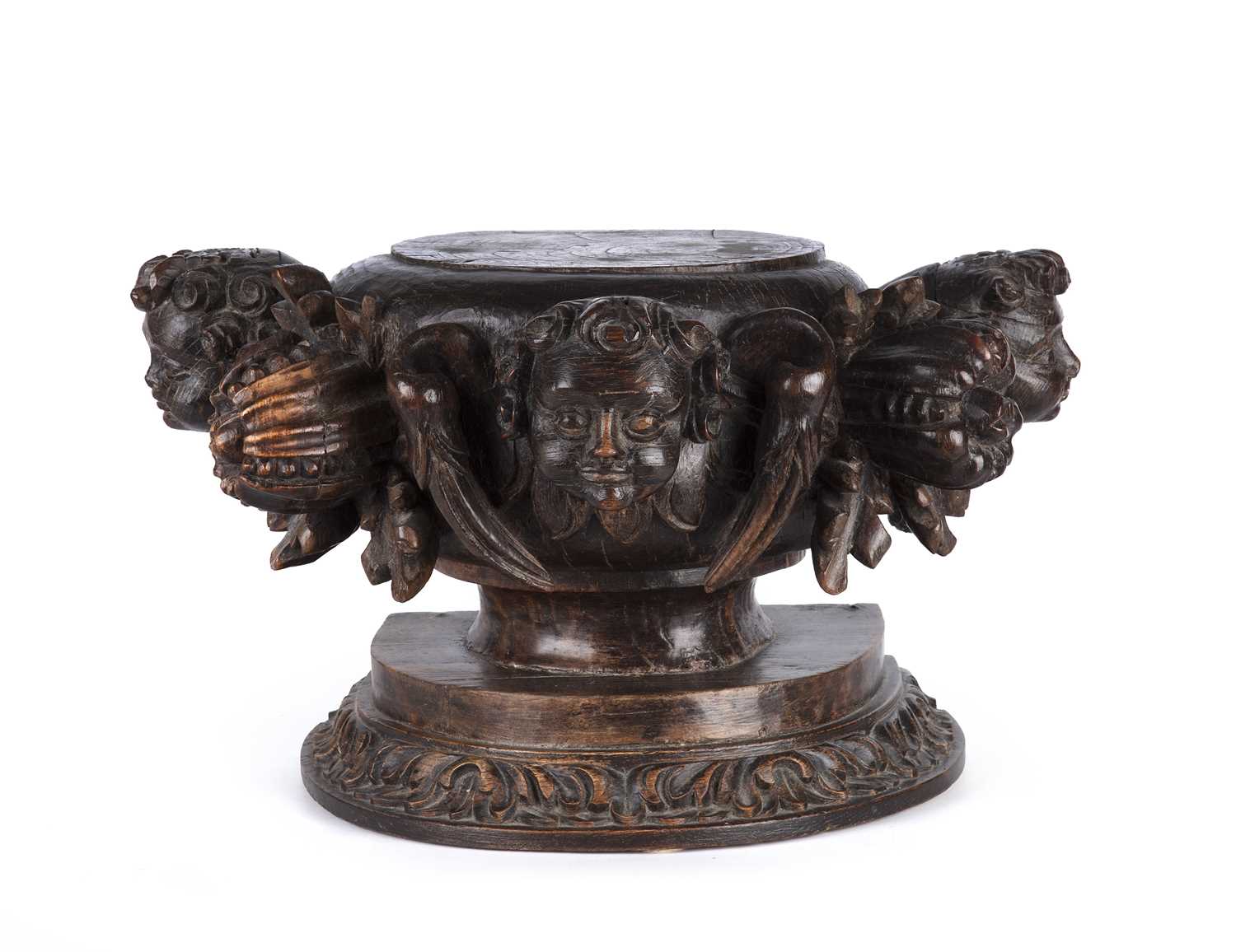 Lot 36 - A 19th century carved oak plinth adorned with...