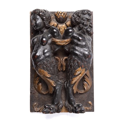 Lot 37 - An early 18th century carved walnut panel...