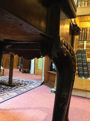 Lot 41 - A George III mahogany fold over card table...