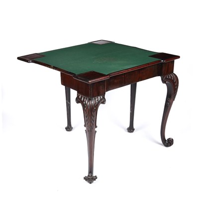 Lot 41 - A George III mahogany fold over card table...