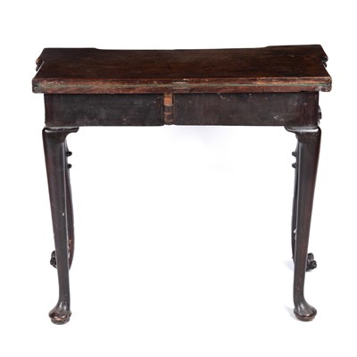 Lot 41 - A George III mahogany fold over card table...