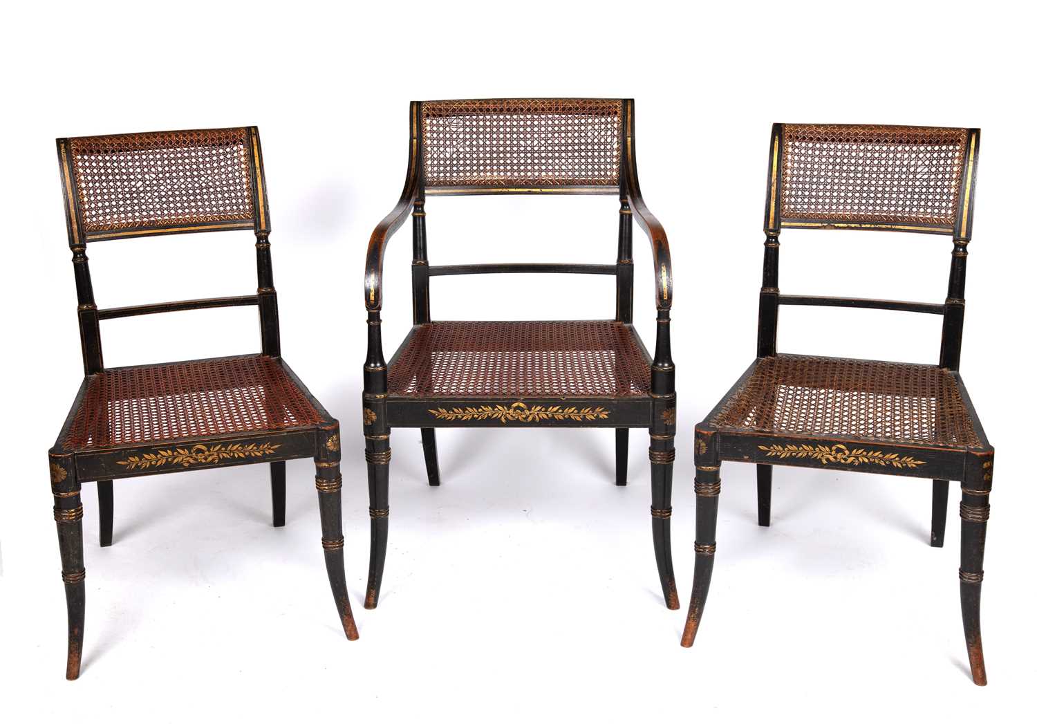 Lot 47 - A set of three Regency painted chairs with...