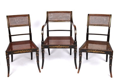Lot 47 - A set of three Regency painted chairs with...