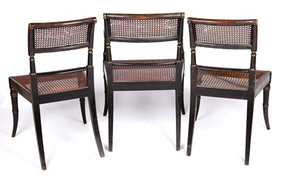 Lot 47 - A set of three Regency painted chairs with...