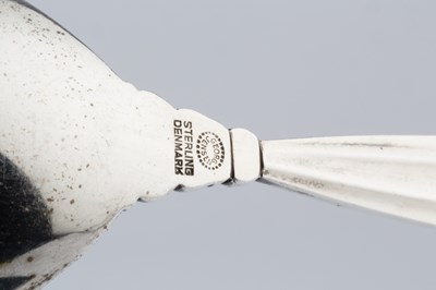 Lot 615 - A Danish silver 'acorn' pattern spoon by Georg...