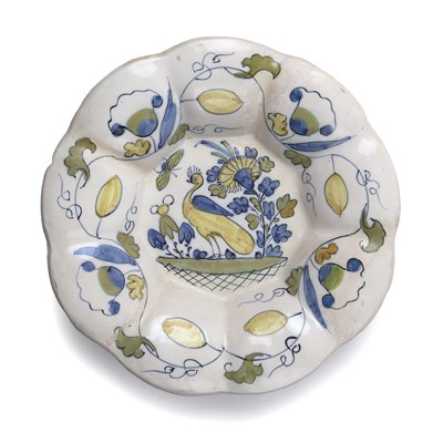 Lot 56 - A 17th century Dutch Delft lobed dish with...