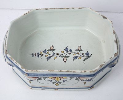 Lot 57 - An 18th century English Delft charger with a...