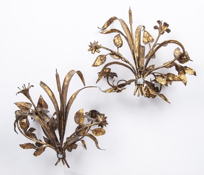 Lot 59 - A pair of gilded metal floral twin branch wall...