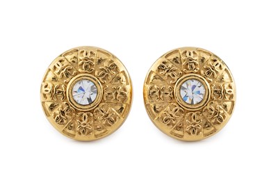 Lot A pair of ear clips by Chanel, each circular...