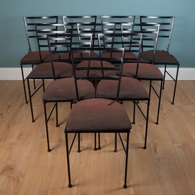 Lot 518 - A set of ten mid-century black-painted metal dining chairs