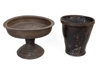 Lot 241 - A turned wood tazza together with a leather fire bucket