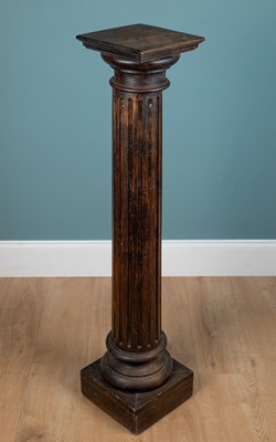 Lot 1097 - A wooden sculpture stand