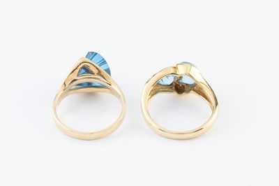 Lot 42 - A diamond and blue stone dress ring, designed...
