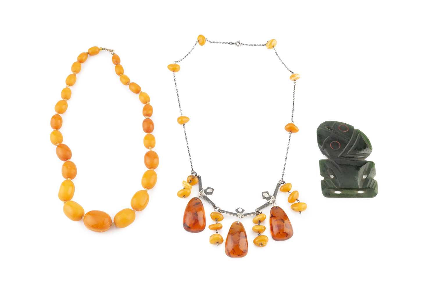 Lot 335 - An amber bead necklace, designed as a single...