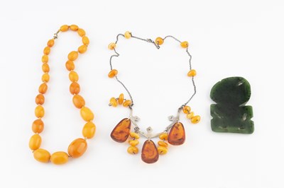 Lot 335 - An amber bead necklace, designed as a single...
