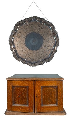 Lot 315 - An oak-cased part canteen of cutlery, together with a large silver-plated salver
