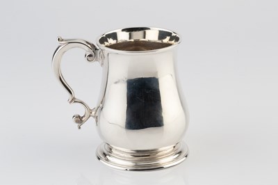 Lot 587 - A George II silver mug, of baluster form with...
