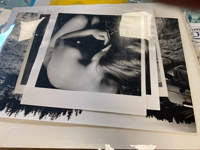 Lot 107 - A collection of black and white photographs and a small group of lithographs