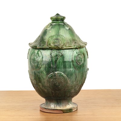 Lot 88 - Green glazed Buddhist stoneware jar and cover...