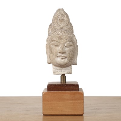 Lot 89 - Carved stone head of Buddha Chinese, Sui or...