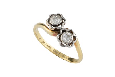 Lot 41 - A diamond two stone ring, of crossover design,...