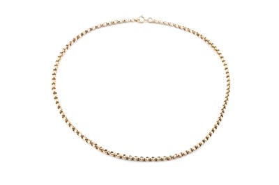 Lot 89 - A yellow precious metal chain, of belcher-link...