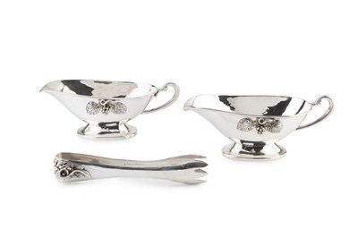 Lot 633 - A pair of Mexican silver sauce boats, applied...