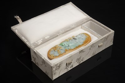 Lot 197 - Jade pale green and brown boulder Chinese, mid-...