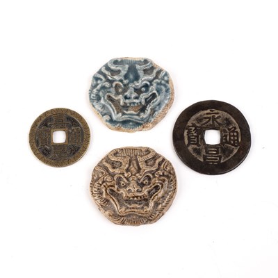 Lot 199 - Two glazed mounts and two coins Chinese the...