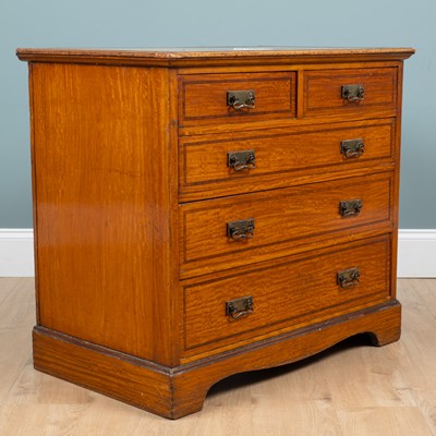 Lot 496 - An Edwardian satinwood chest of drawers