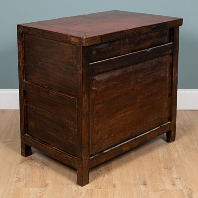 Lot 244 - A Chinese red lacquer side cabinet