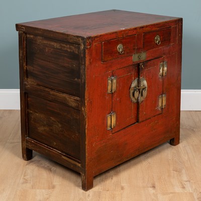 Lot 244 - A Chinese red lacquer side cabinet