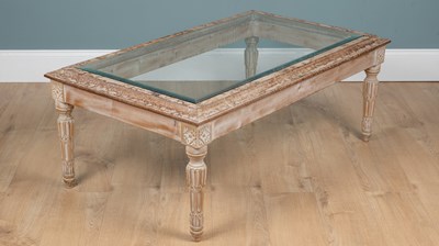 Lot 246 - A limed oak and pine rectangular coffee table