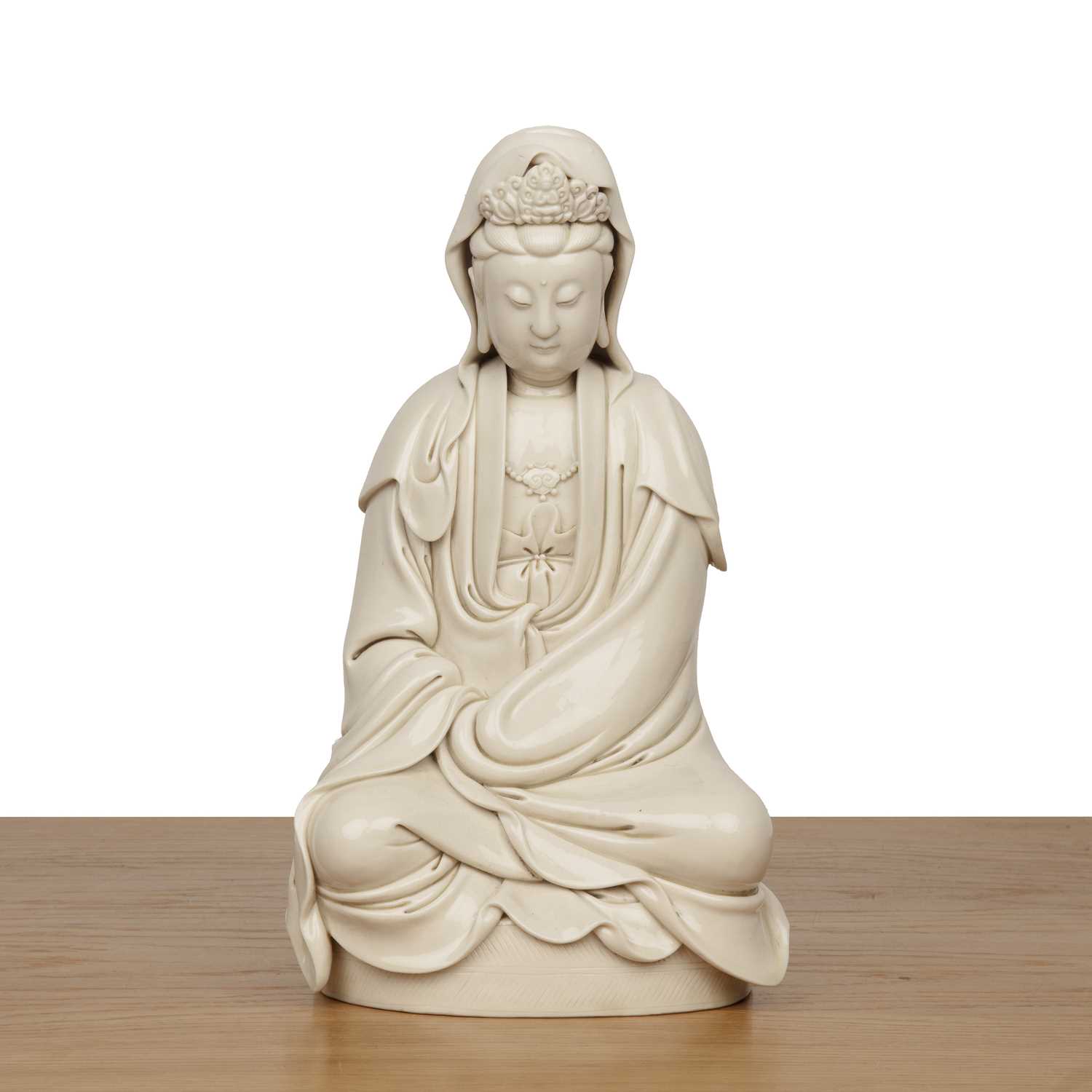 Lot 242 - Blanc-de-Chine figure of Guanyin Chinese,...
