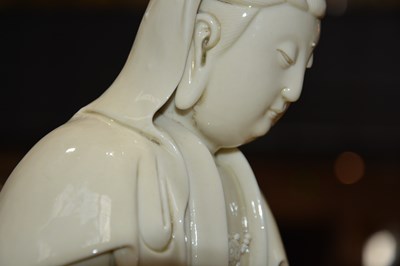 Lot 242 - Blanc-de-Chine figure of Guanyin Chinese,...
