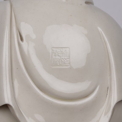 Lot 242 - Blanc-de-Chine figure of Guanyin Chinese,...