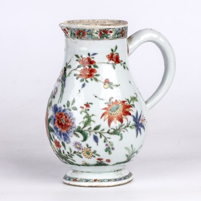 Lot 176 - An early 18th century Chinese jug with...