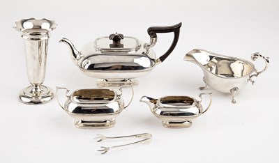 Lot 228 - Silver three-piece tea set The teapot with...