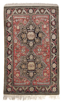 Lot 66 - A 20th century Kashmiri silk rug with a banded...