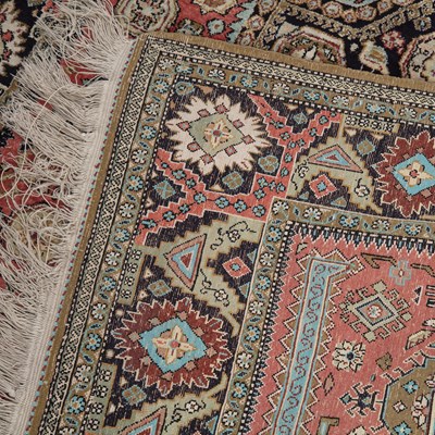 Lot 66 - A 20th century Kashmiri silk rug with a banded...