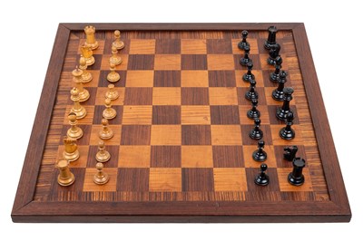 Lot 424 - A Staunton chessboard and chess pieces