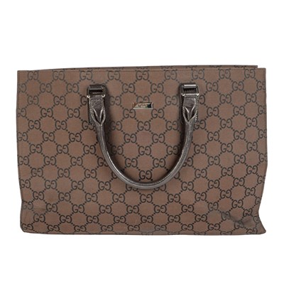 Lot 321 - A GUCCI leather business tote in GG canvas and...