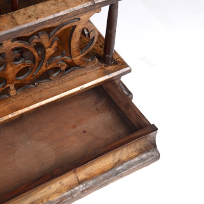 Lot 96 - A Victorian walnut canterbury with a single...