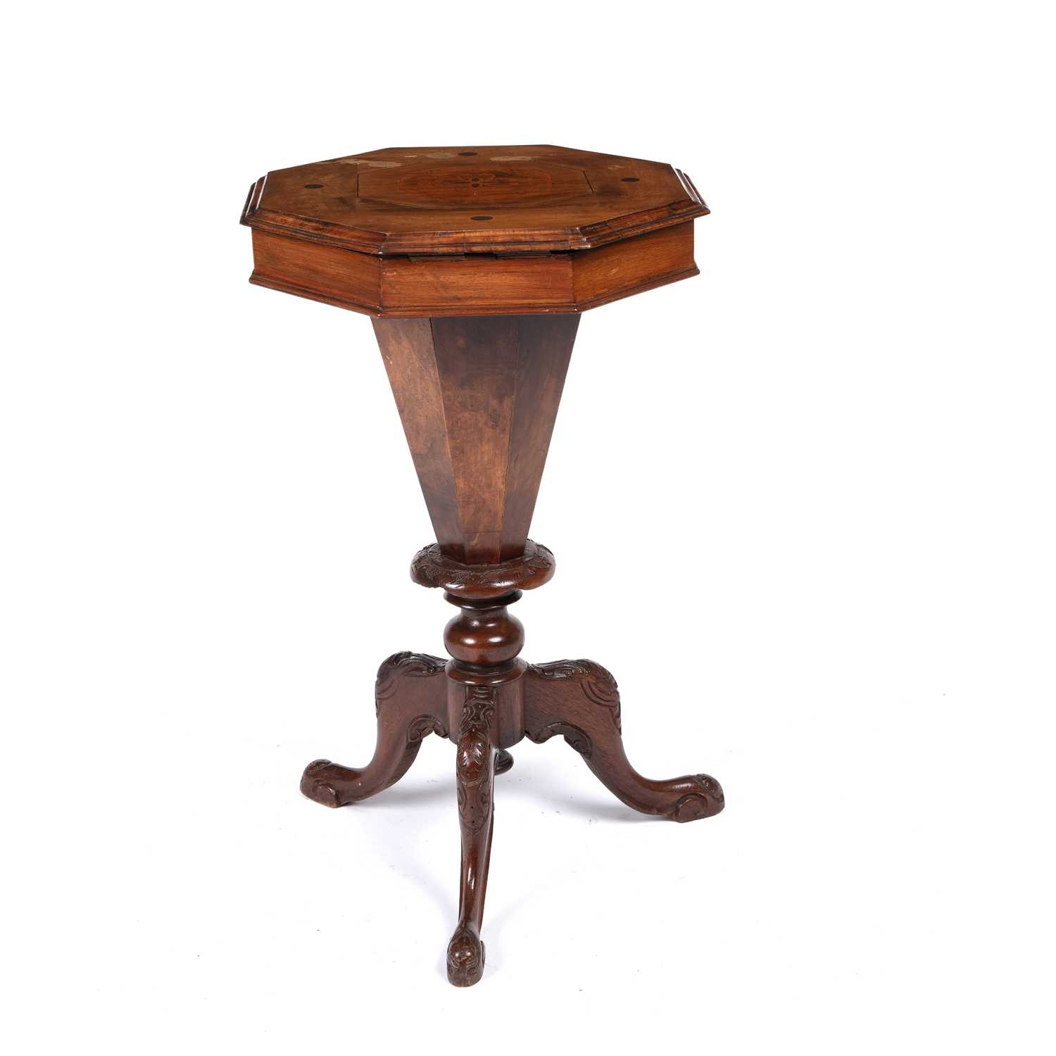 Lot 98 - A Victorian walnut octagonal sewing table with...