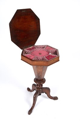 Lot 98 - A Victorian walnut octagonal sewing table with...